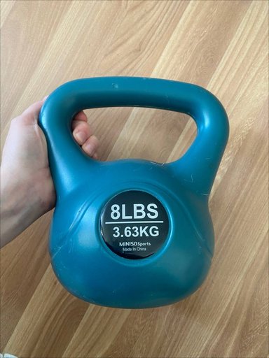 Гиря весом 3,36 килограмма